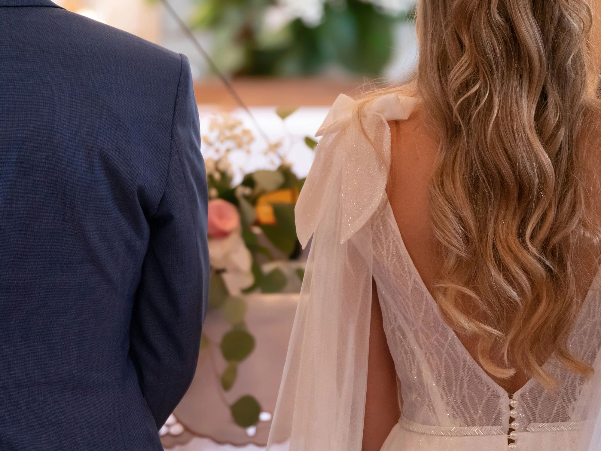 Bride and groom standing together during a church ceremony